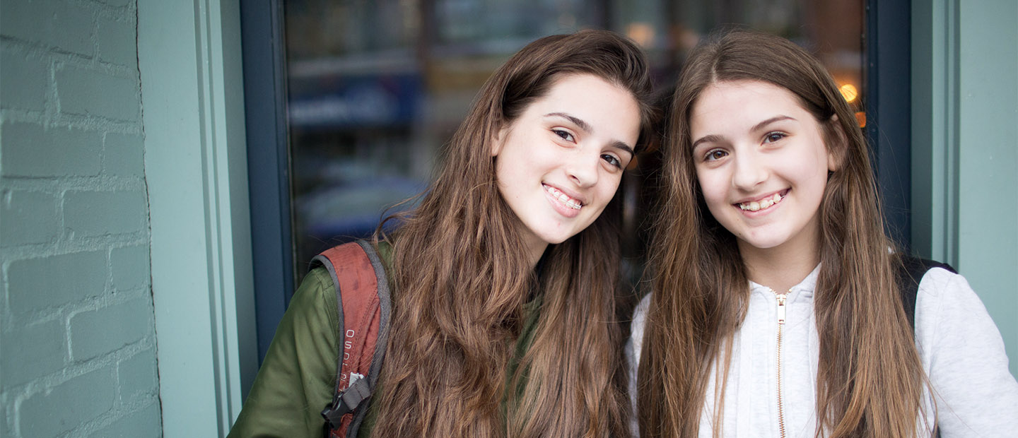 orthodontist dr. robert lopatkin and patient talking about braces